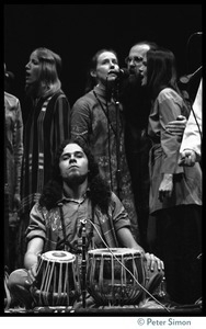 Tabla player performing with Amazing Grace at a Dharma Festival