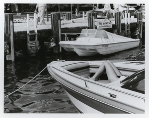 Boat and dock scene with legs