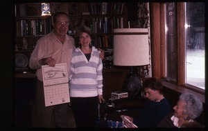 Nina Keller with father holding 1988 calendar