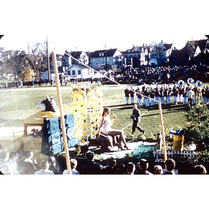 Homecoming parade float and marching band