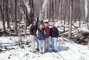 Norman E. Borlaug field trip to the Hopkins Memorial Forest. 8. Left to right: Permanent Plotters Henry W. Art, Emilie Grossmann (Class of 1996), Norman E. Borlaug (U MN, Class of 1937), and Peter McChesney (Class of 1975).