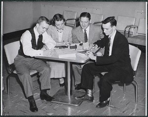 Four members of the Boston College Class of 1956 hard at work