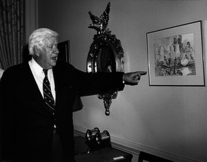 Thomas P. O'Neill pointing at painting in the Speaker's office