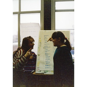 Two girls participating in a Teen and Kid Empowerment Program class.