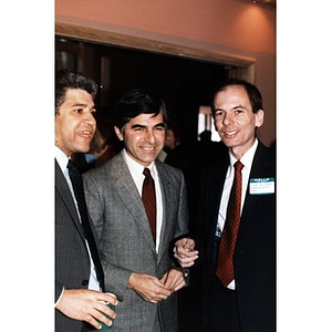 Governor Dukakis with Jorge Hernandez and an unidentified man at the opening of the Villa Victoria Cultural Center.