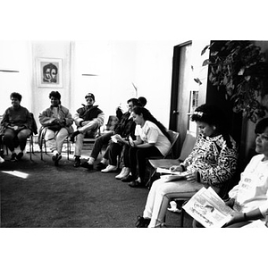 Community members sit in a circle during a community meeting held at the Inquilinos Boricuas en Acción offices.