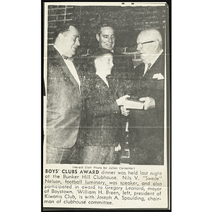 A reproduction of a Boston Hearld photo from a Boys' Clubs award dinner