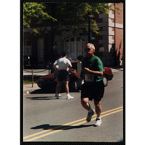 A man runs in the Battle of Bunker Hill Road Race