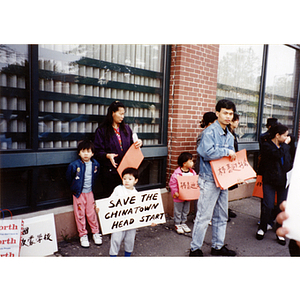 Adults and children participating in the Head Start rally in Chinatown, Boston