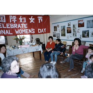 Seated guests at an International Women's Day event