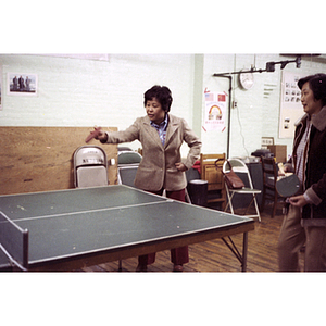 Players at Chinese Progressive Association International Women's Day ping-pong tournament