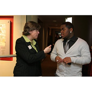 Elizabeth Hill speaks with Ulysses Ifill at a Torch Scholars event