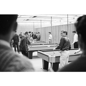 Students play pool in the new Ell Student Center