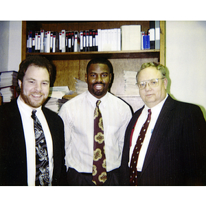 Three men in an office