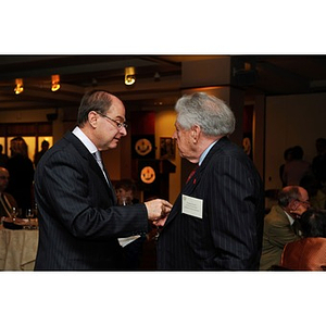 President Aoun speaking to Dennis Picard at the Huntington Society dinner