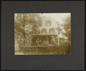 Exterior view of a house with three people on the porch, Newport, R.I., undated