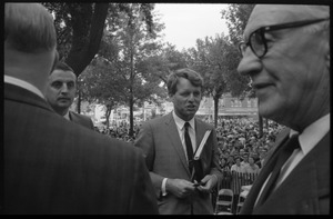 Robert F. Kennedy, walking away from the podium after speaking on behalf of Democratic candidates in front of the Noble County courthouse (Walter Mondale at left)