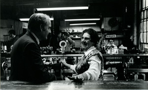 George McGovern with woman in factory