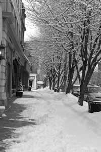 Sidewalk in front of the shops along Route 7 (near the corner of Railraod and Main) after a late-winter snow