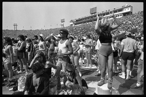 Woman in the crowd dancing at the Live Aid Concert, JFK Stadium