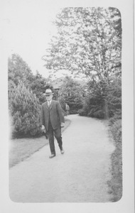 F. A. Waugh walking along a path