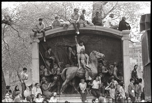 Demonstration at State House against the killings at Kent State: protesters on monument to the 54th Massachusetts Infantry, Boston Common