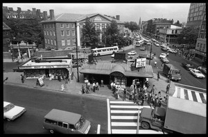 Harvard Square: bird's-eye view of news kiosk, subway station, and intersection, looking east along Massachusetts Avenue
