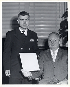 Mayor John F. Collins with unidentified man in uniform