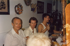 A Photograph of Marsha P. Johnson Sitting at a Table with Randy Wicker, George Flimlin, and Willie Brashears