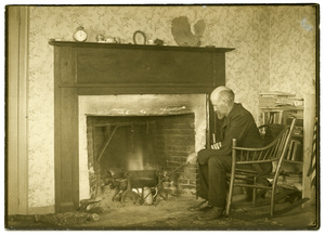 Captain Slocum by his own old fashioned fireplace