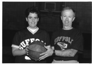 Suffolk University women's basketball player Noreen McBride, New England Women's and Men's Athletic Conference (NEWMAC) player of the week with coach Ed Leydon, 1996