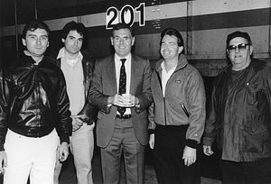 Mayor Raymond L. Flynn (center) with unidentified men