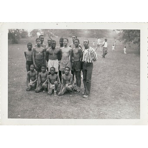 A group of young men pose in a field at Breezy Meadows Camp