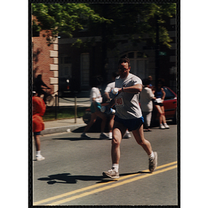 A man runs in the Battle of Bunker Hill Road Race