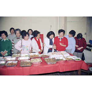 Cake-cutting at an International Women's Day event