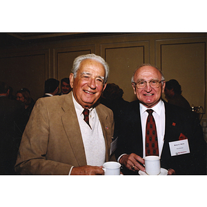 George S. Kariotis and Robert C. Marini at the annual Board of Trustees meeting