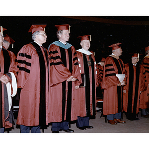 President Ryder stands with honorary degree recipients and speaker Senator Ted Kennedy at commencement