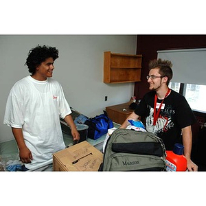 Danny Vazquez and Jordan Munson unpack during move-in