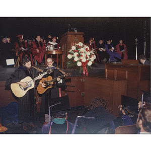 Two guitarists perform at the 1983 Law School commencement