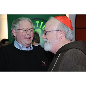 Neal Finnegan, left, and Cardinal O'Malley, right, at a Beanpot Reception