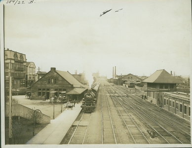 Railway station west from bridge, Allston, Mass., undated