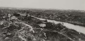 View of mechanical debris with the Yser [IJzer] river in the background