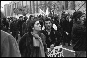 Couple marching in the Counter-inaugural demonstrations, 1969, against the War in Vietnam
