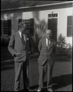 Sinclair Lewis (left) and unidentified guest at his home