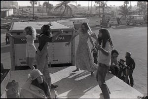 Hollywood Speedway Rock Festival: long-haired men and women dancing energetically at rock concert