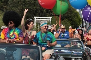 Paraders riding in cars : Provincetown Carnival parade