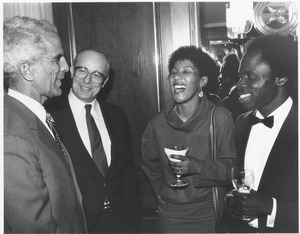 Joseph D. Duffey conversing with Franklin Williams, Makaziwe Mandela and Isaac Amuah