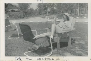 Bernice Kahn in an adirondack chair with her feet up