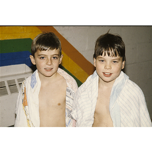 Boys toweling off after swimming