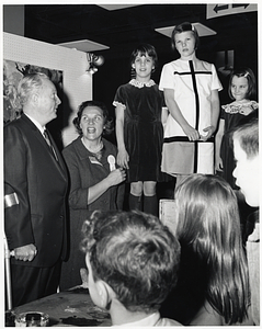 Mayor John F. Collins with an unidentified woman and children